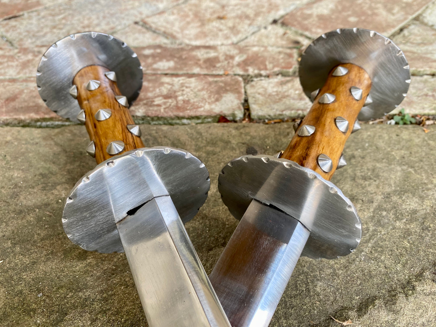 Pair of Tod Cutler Studded Grip Rondels close up