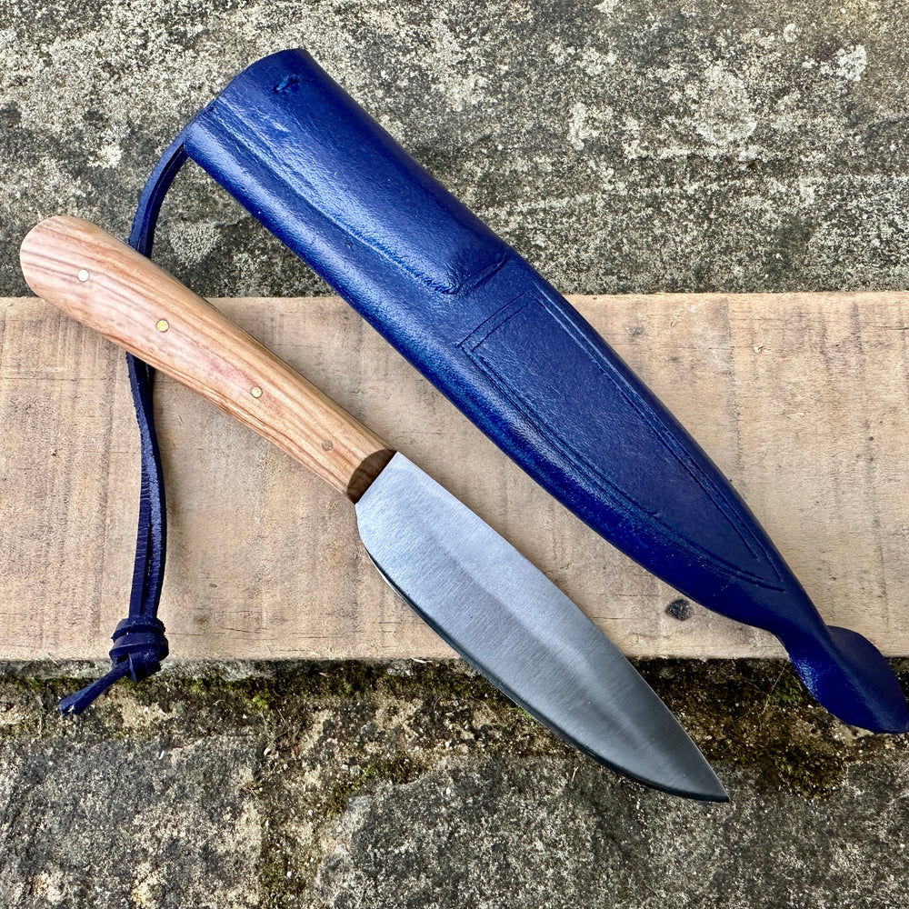 
                  
                    Medieval peasants eating knife with wooden handle with blue shaeath
                  
                
