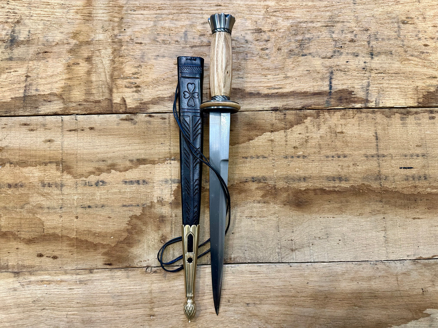 
                  
                    Tod Cutler English Rondel. With black scabbard. 
                  
                