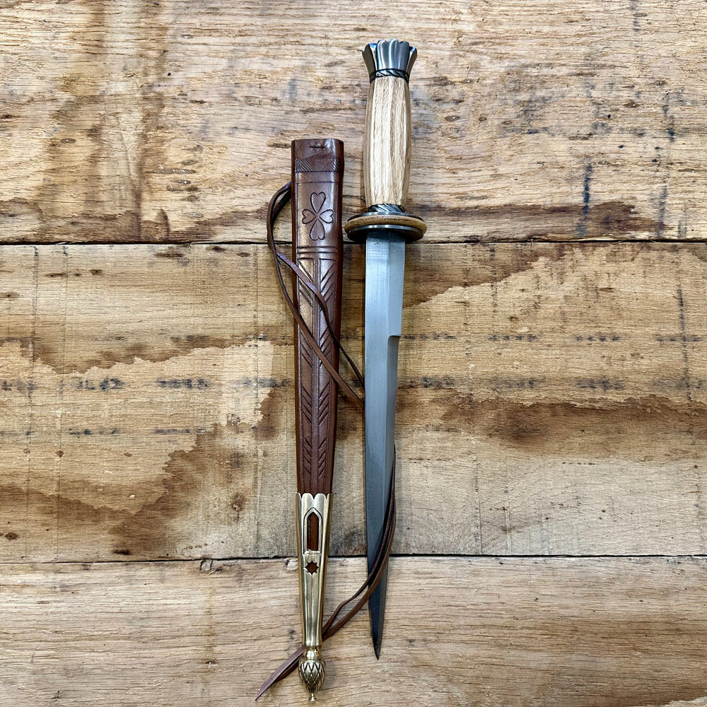 
                  
                    Tod Cutler English Rondel.  With brown scabbard. 
                  
                