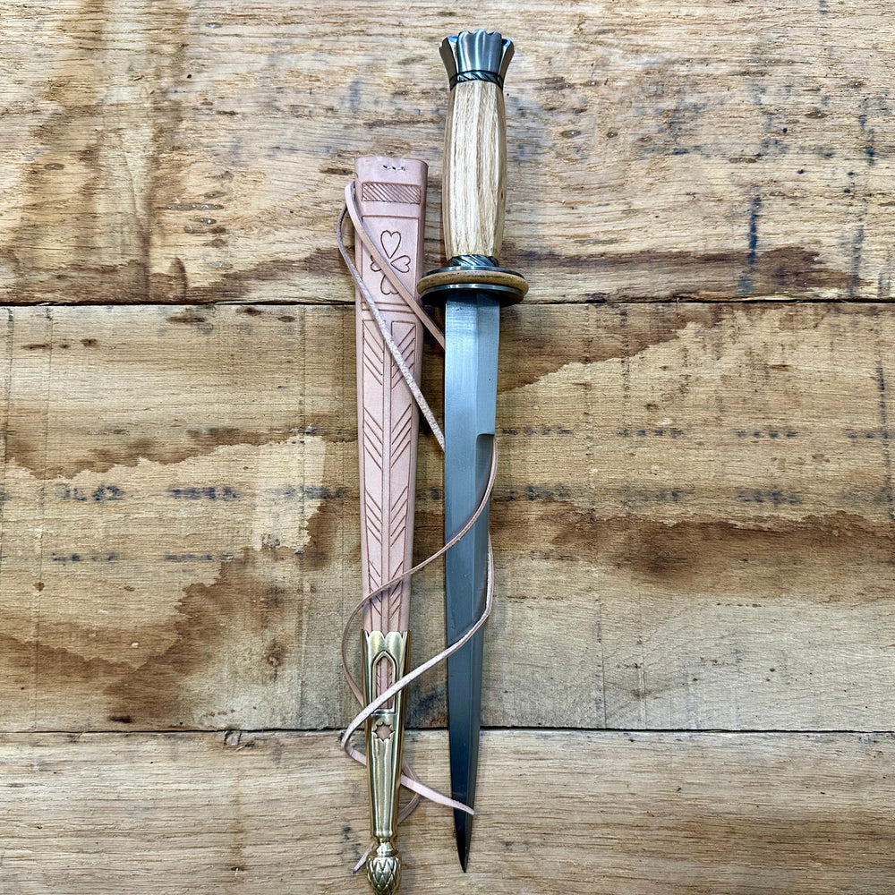 
                  
                    Tod Cutler English Rondel. With natural scabbard.
                  
                