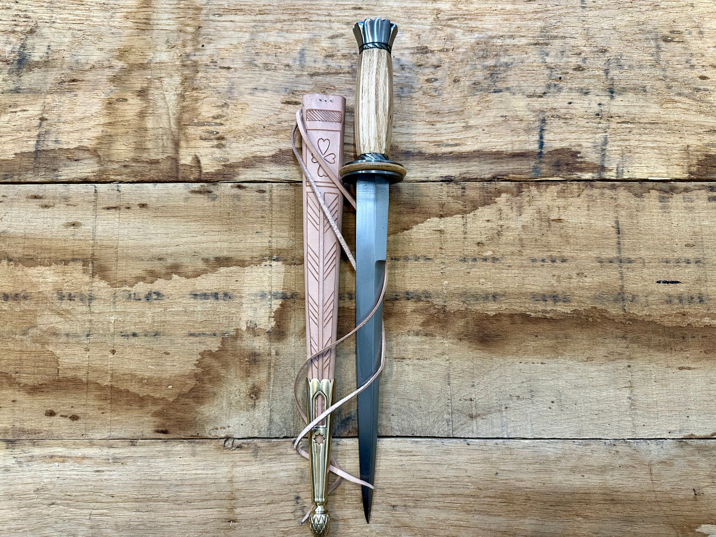 
                  
                    Tod Cutler English Rondel. With natural scabbard.
                  
                