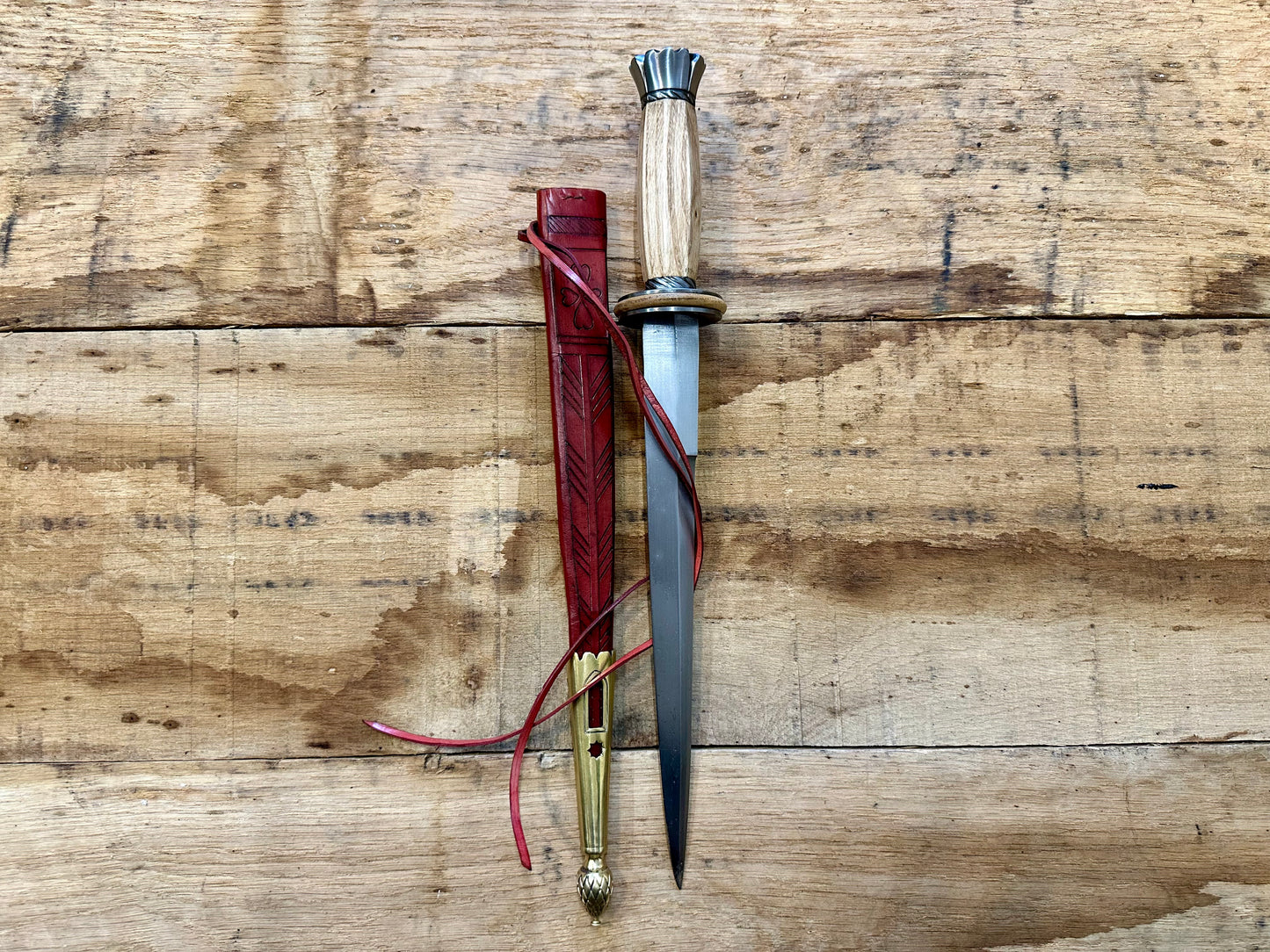 
                  
                    Tod Cutler English Rondel. With red scabbard.
                  
                
