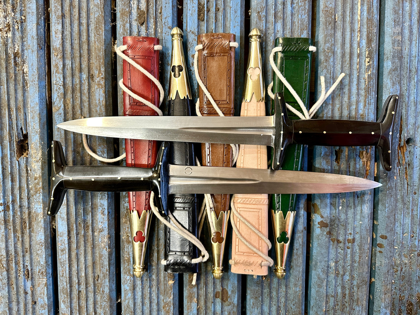 14th-15th Century Italian Horn Baselard. With red, black, brown, natural and green scabbards.