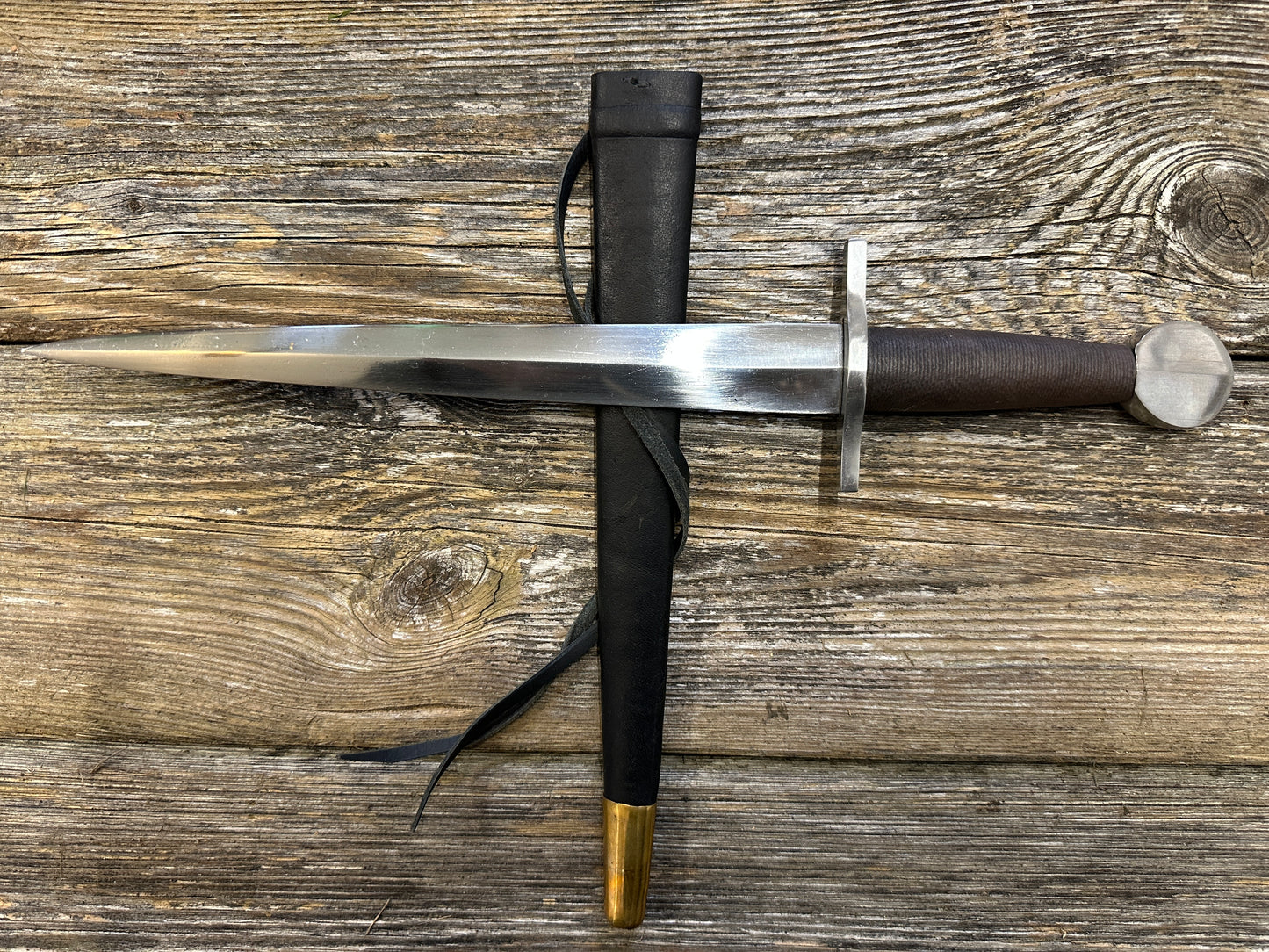 12-17thC Quillon Dagger with a black scabbard