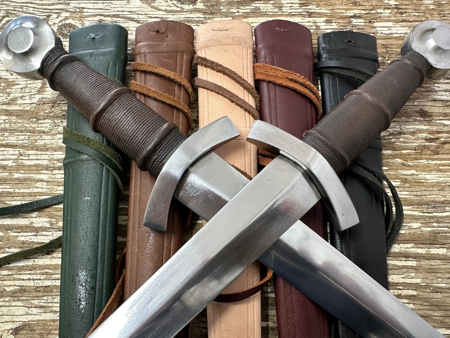 14thC Quillon Dagger on green, brown, natural, red and black scabbards