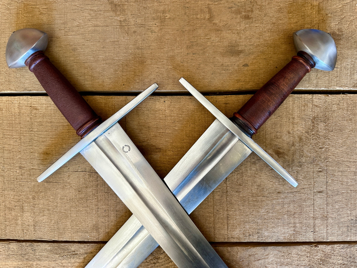 Viking Norman Brazil Nut Sword. Two crossed swords, top view.