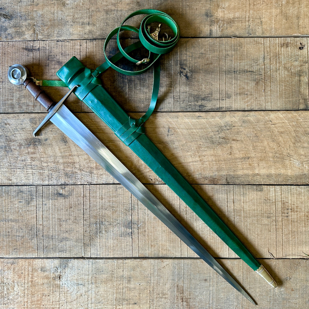 
                  
                    Castillon single handed sword with green scabbard
                  
                