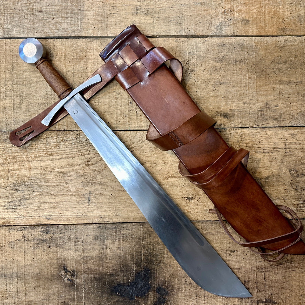 
                  
                    Cleaver Falchion from Tod Cutler. With a brown scabbard.
                  
                