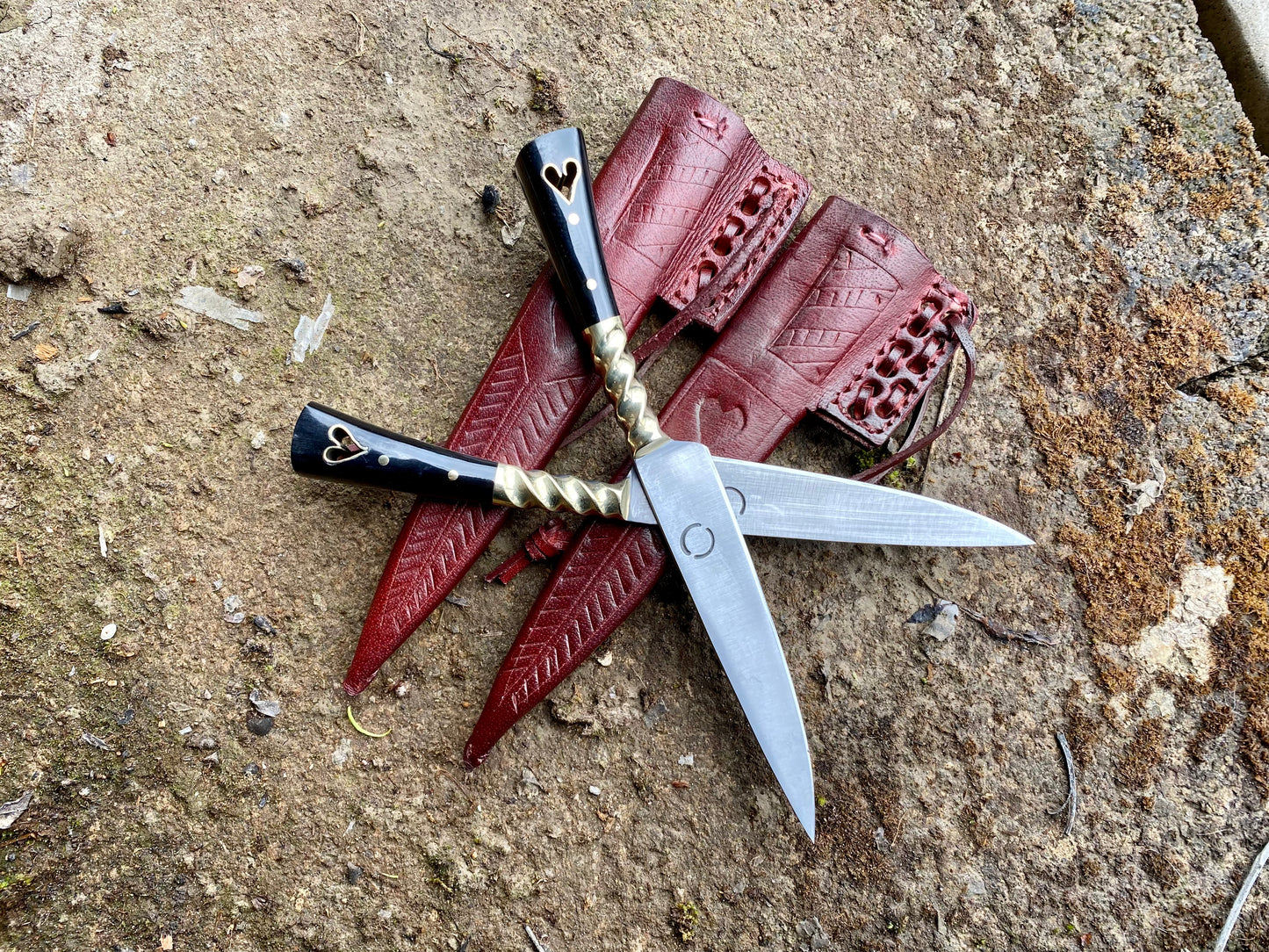 Pair of Tod Cutler heart eating knives