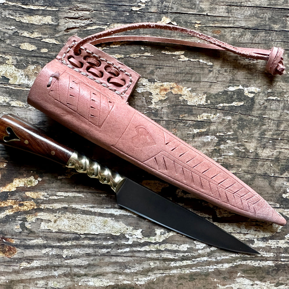 
                  
                    Heart eating knife with a natural sheath
                  
                