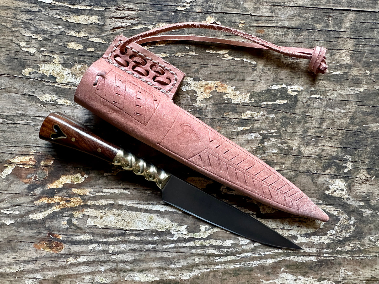 
                  
                    Heart eating knife with a natural sheath
                  
                