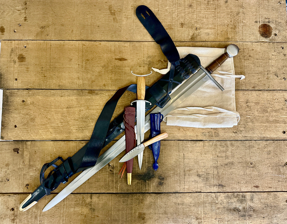 12th Century single-handed sword, 11-14th Century Antennae Dagger and 12-14th Century Peasants eating knife with sword bag (out of scabbards)