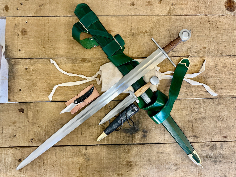 13 - 15th Century Single-handed sword, Late 13th Century Quillon Dagger, 13 - 15th Century Horn folding knife and sword bag (out of scabbards)