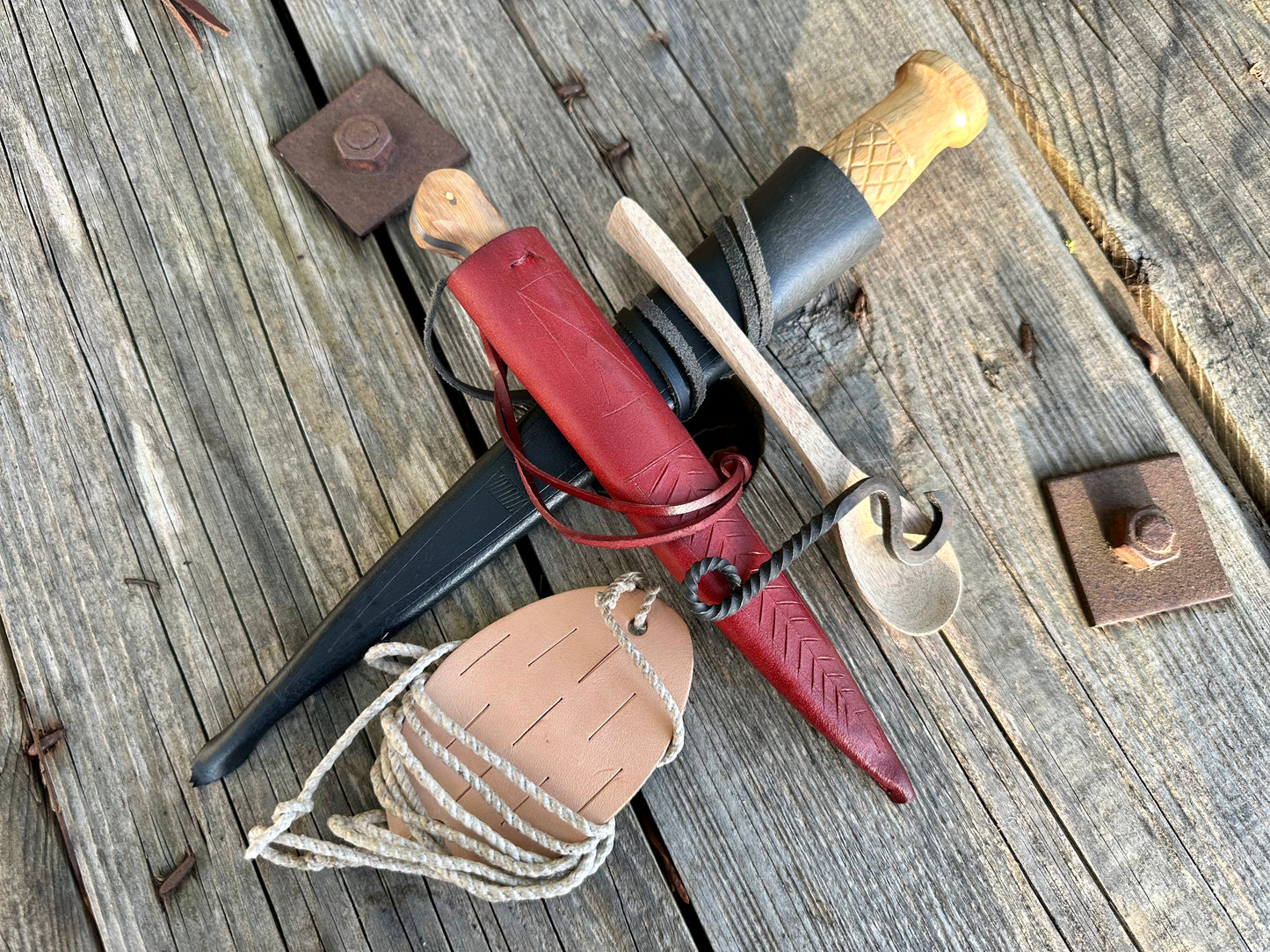 
                  
                    Whittle Tang dagger with sling, bottle opener, eating knife and wooden spoon
                  
                