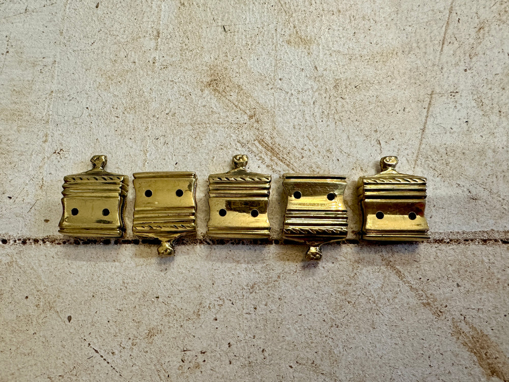 Set of 5 brass belt ends