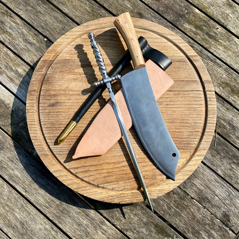 
                  
                    Tod Cutler curved  cleaver  with stiletto dagger. The BBQ bundle
                  
                