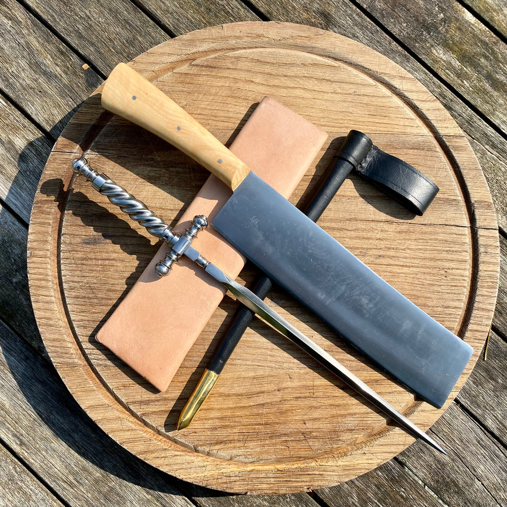 
                  
                    Tod Cutler straight edge cleaver  with stiletto dagger. The BBQ bundle
                  
                