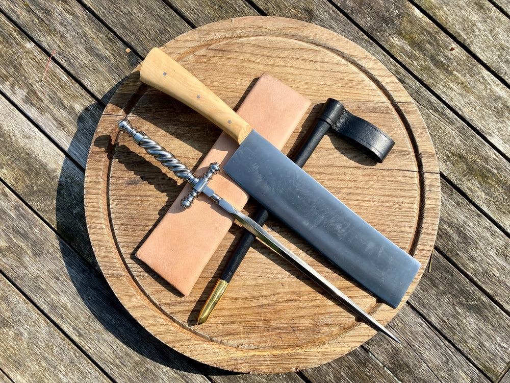 
                  
                    Tod Cutler straight edge cleaver  with stiletto dagger. The BBQ bundle
                  
                