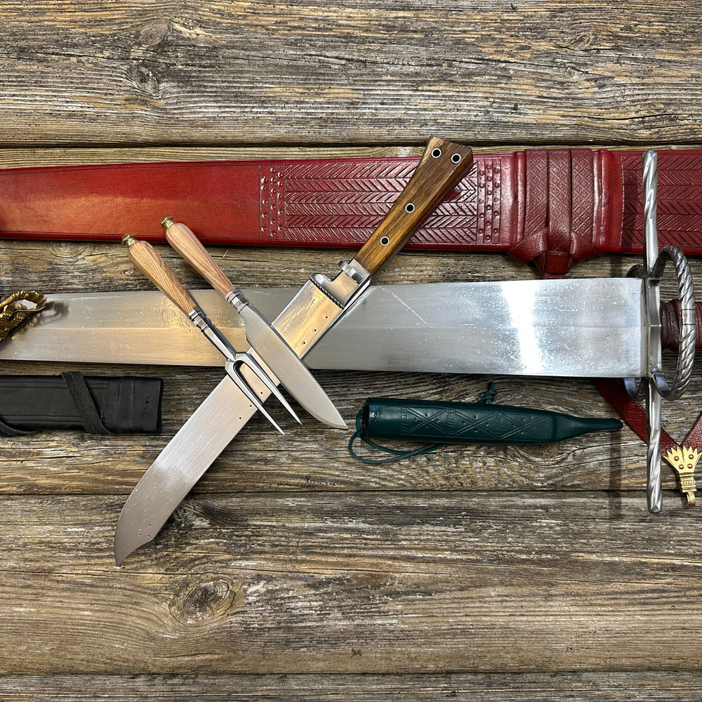 
                  
                    The Big Weapon Bundle. Sword, knife, eating set with sheathes and leather pouch. 
                  
                