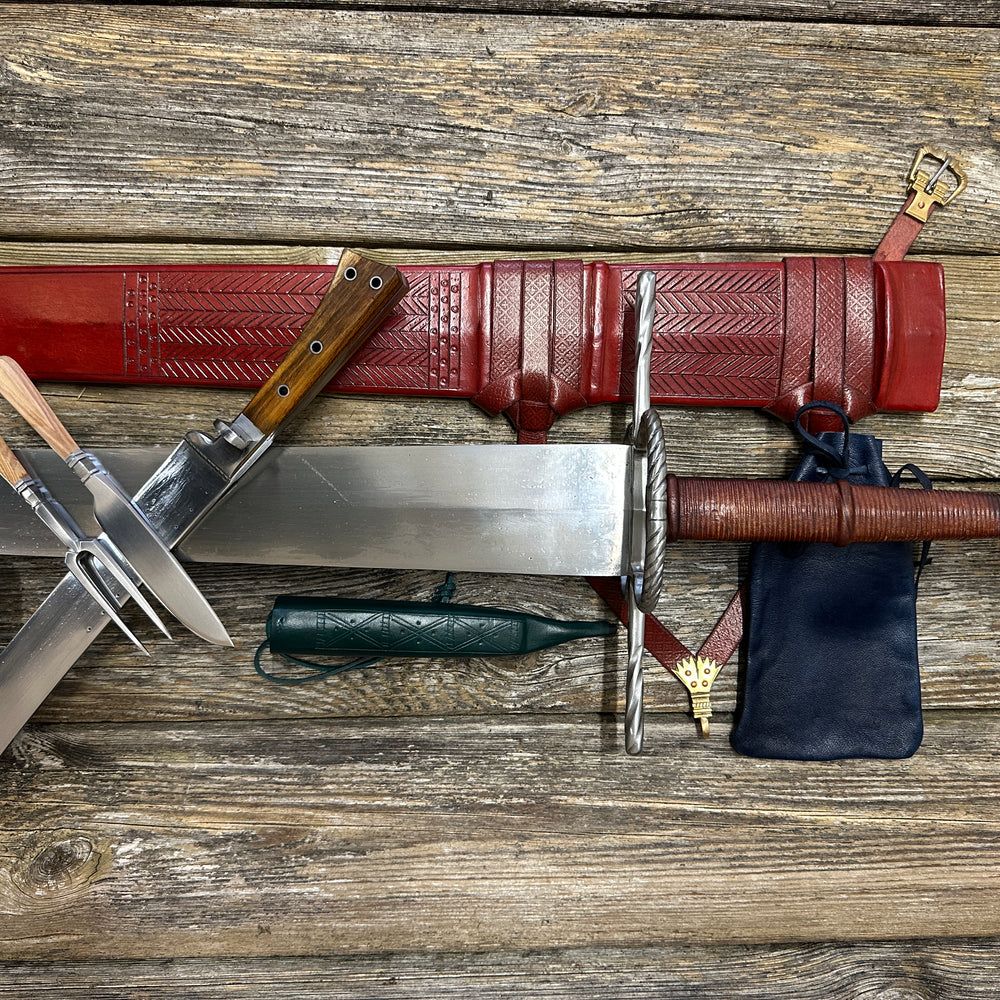 
                  
                    The Big Weapon Bundle. Sword, knife, eating set with sheathes and leather pouch. 
                  
                