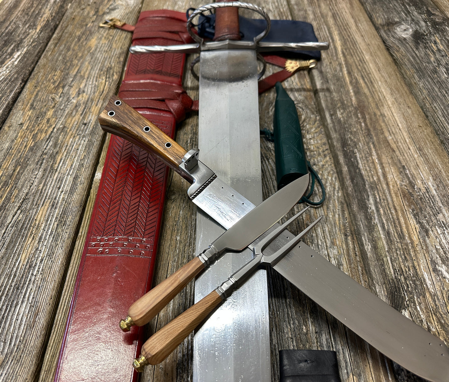 The Big Weapon Bundle. Sword, knife, eating set with sheathes and leather pouch. 