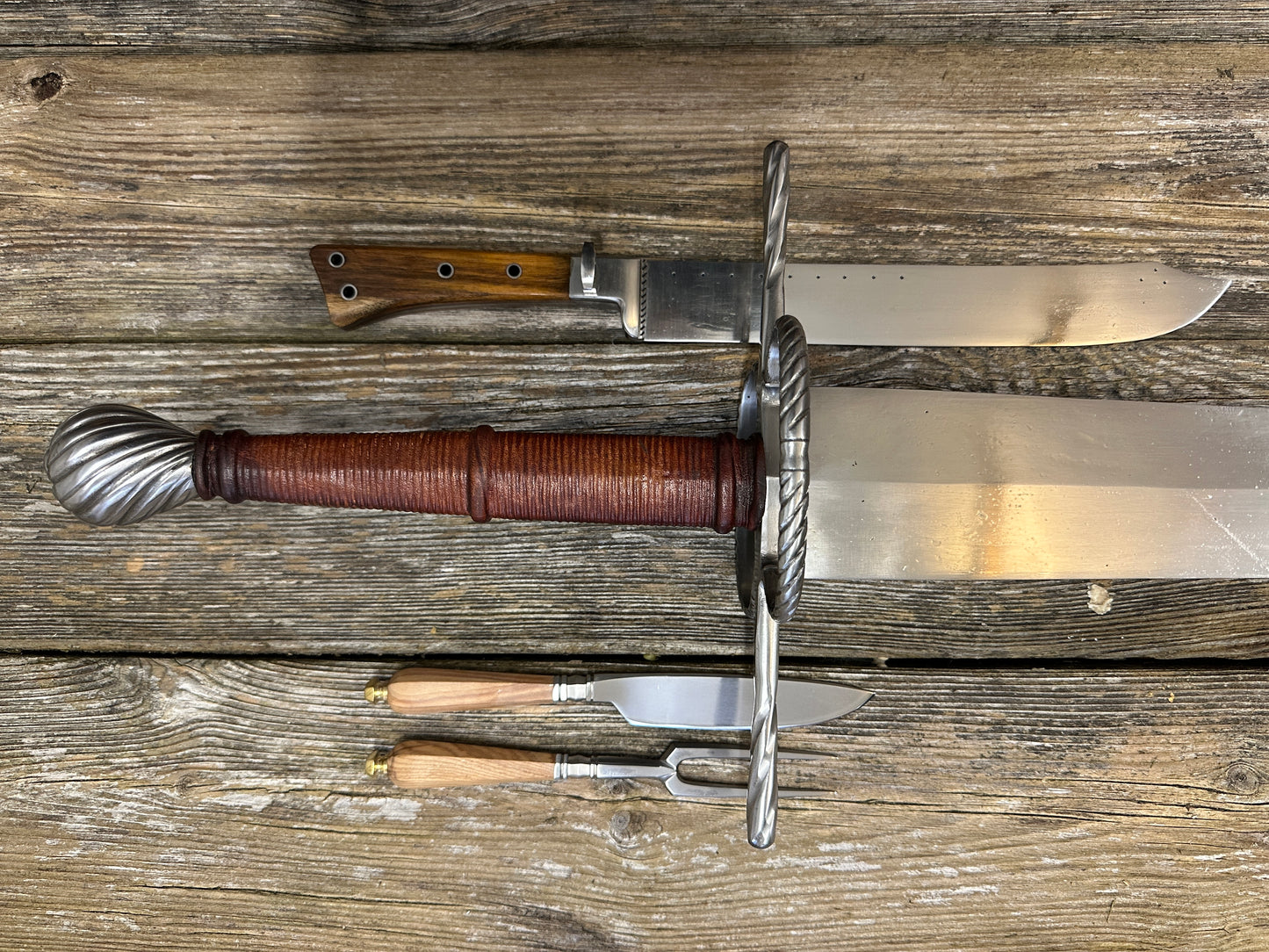 
                  
                    The Big Weapon Bundle. Sword, knife, eating set.
                  
                