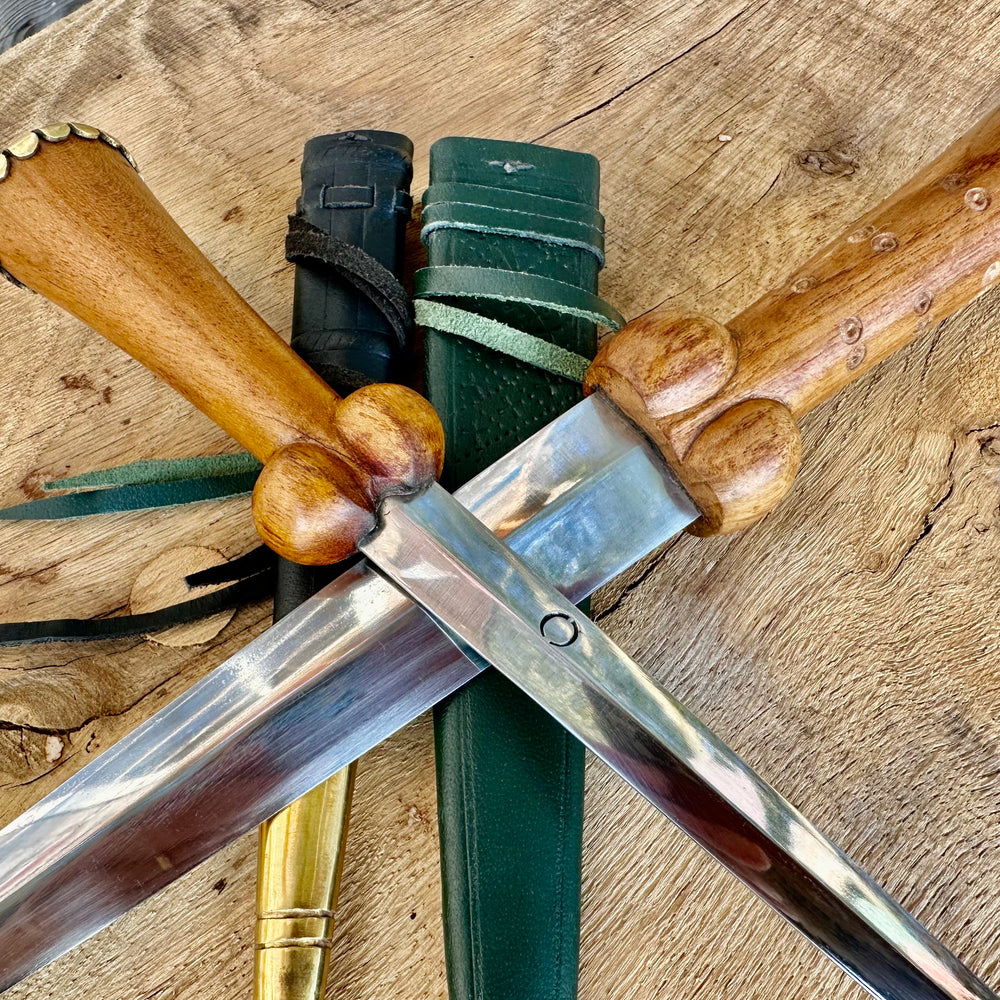 
                  
                    Tod Cutler purse bollock dagger and dot and circle bollock daggers
                  
                