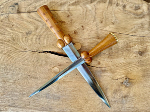 
                  
                    Tod Cutler purse bollock dagger and dot and circle bollock daggers
                  
                