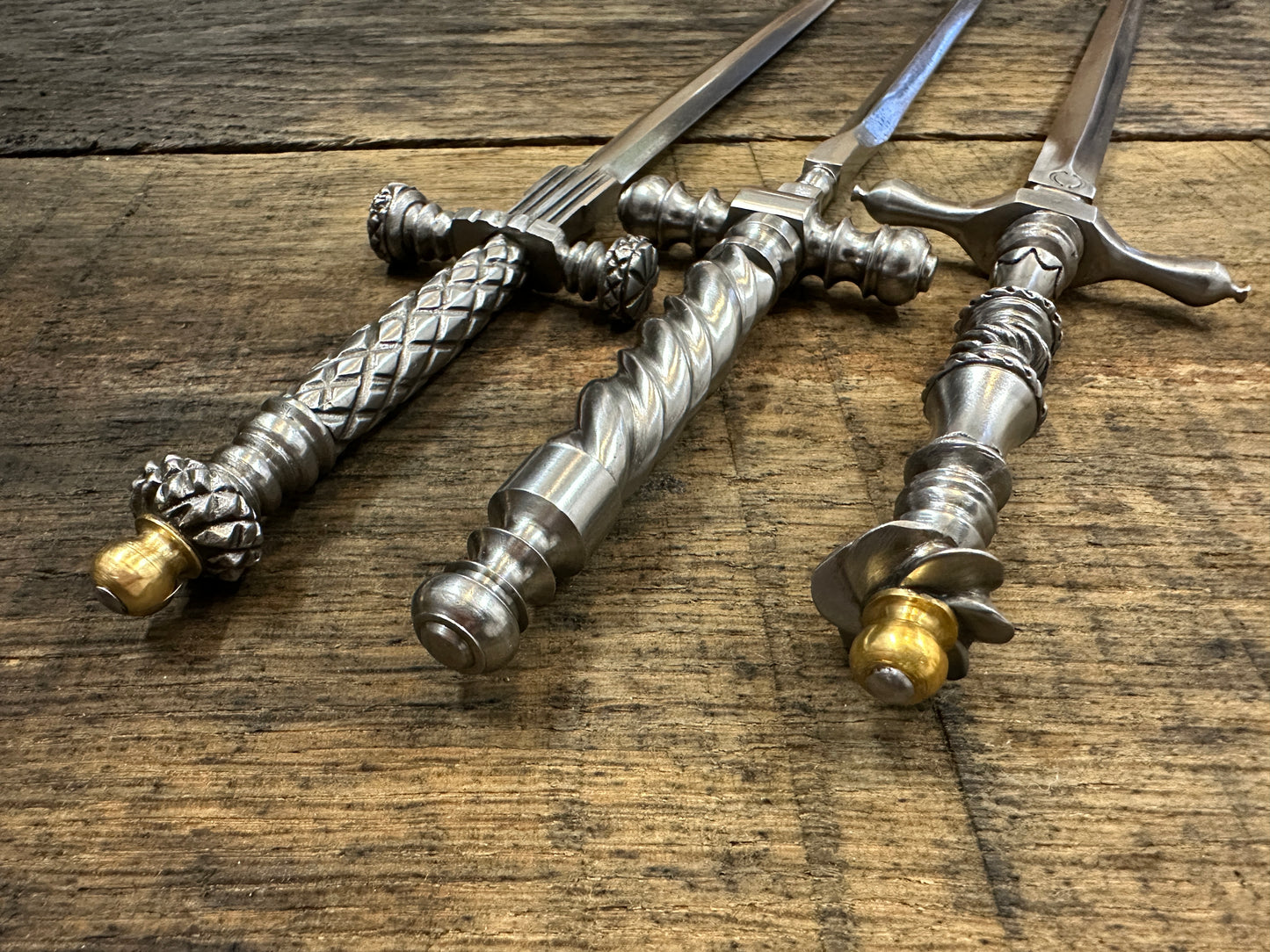 
                  
                    The Stibbert, the Pitt Rivers and the original Tod Cutler Stiletto daggers close up view from the top down.
                  
                