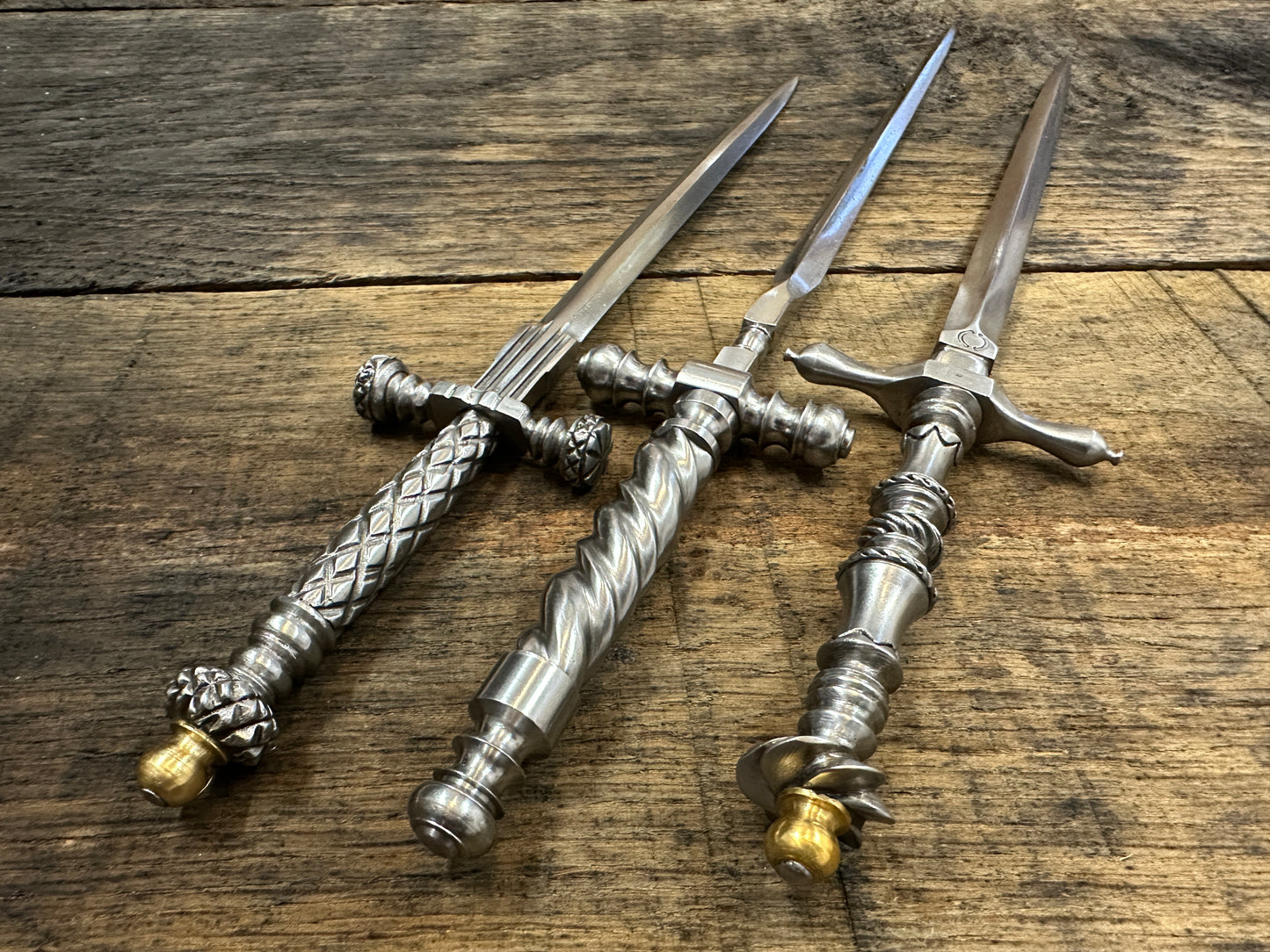 
                  
                    The Stibbert, the Pitt Rivers and the original Tod Cutler Stiletto daggers viewed from the top down.
                  
                