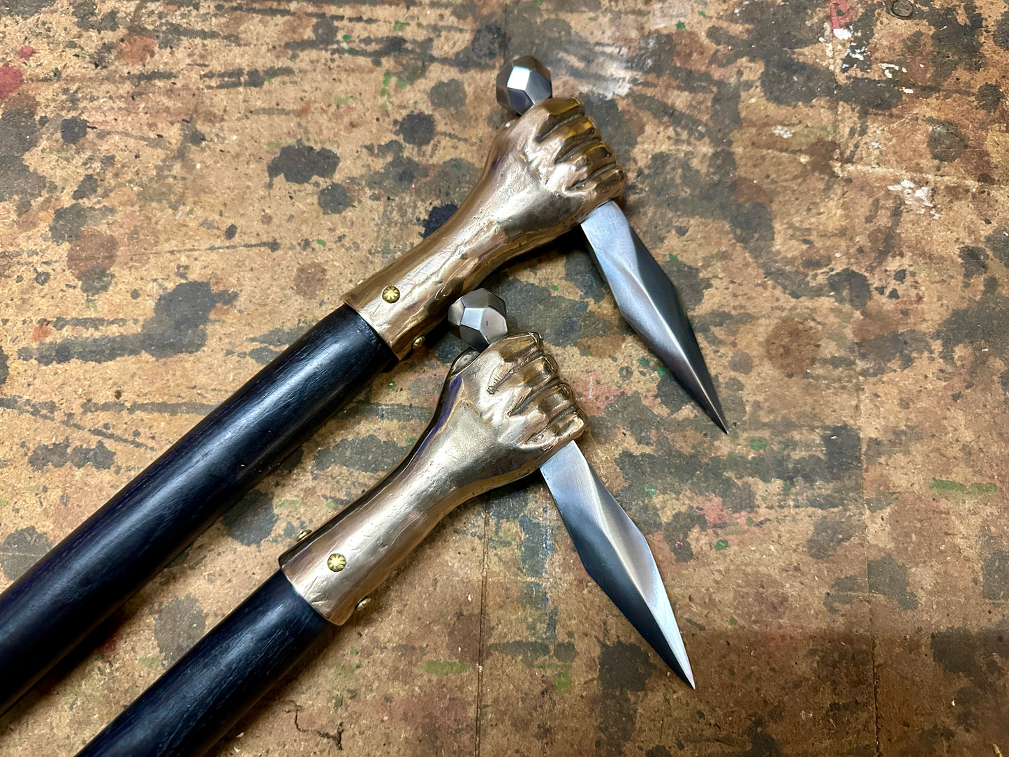 two fist hammers side by side close up