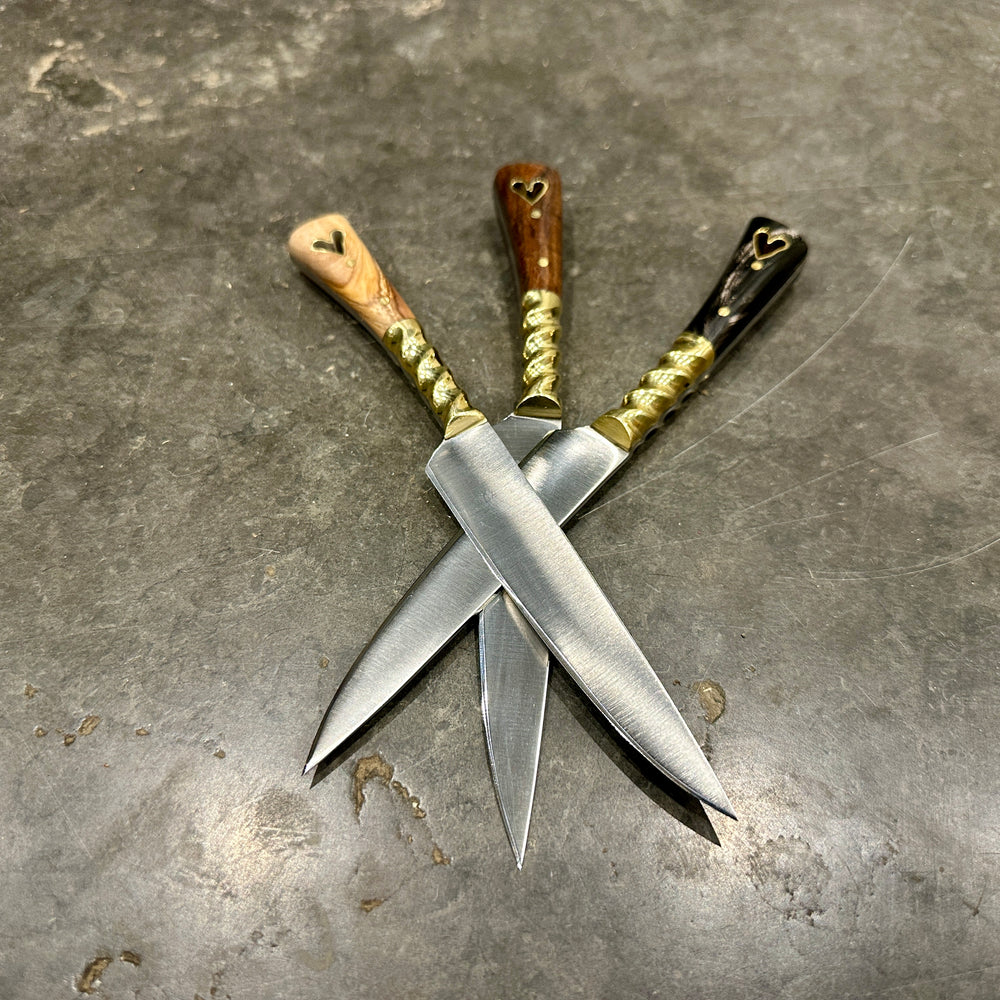 
                  
                    Set of three eating knives
                  
                