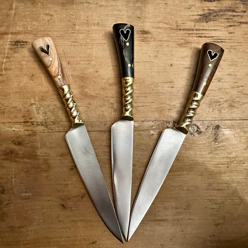 
                  
                    Set of three eating knives
                  
                