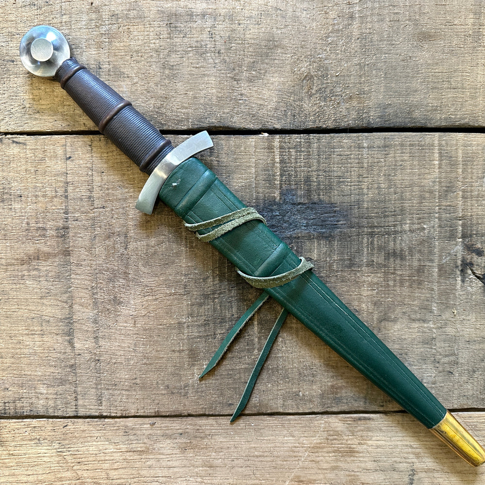 
                  
                    14thC Quillon Dagger. In green scabbard.
                  
                