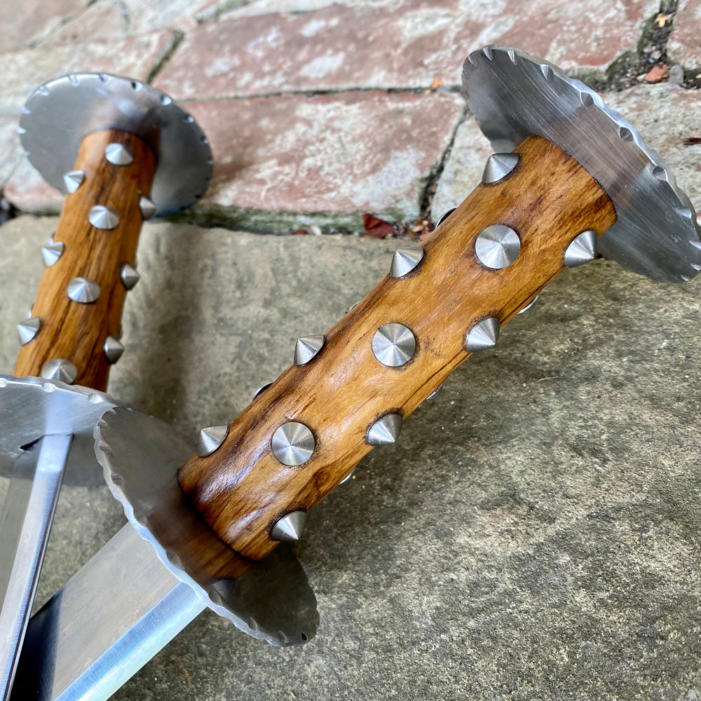 
                  
                    Pair of Tod Cutler Studded Grip Rondels close up
                  
                