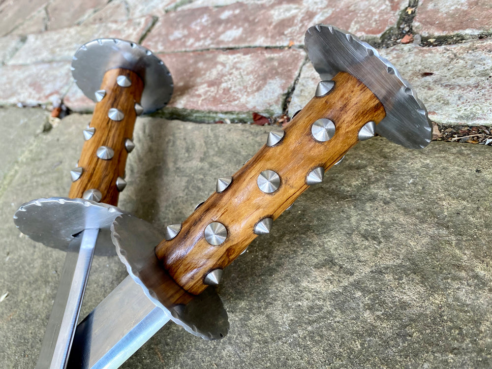 
                  
                    Pair of Tod Cutler Studded Grip Rondels close up
                  
                