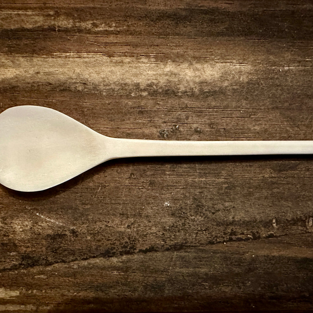 Feather finial bone spoon 