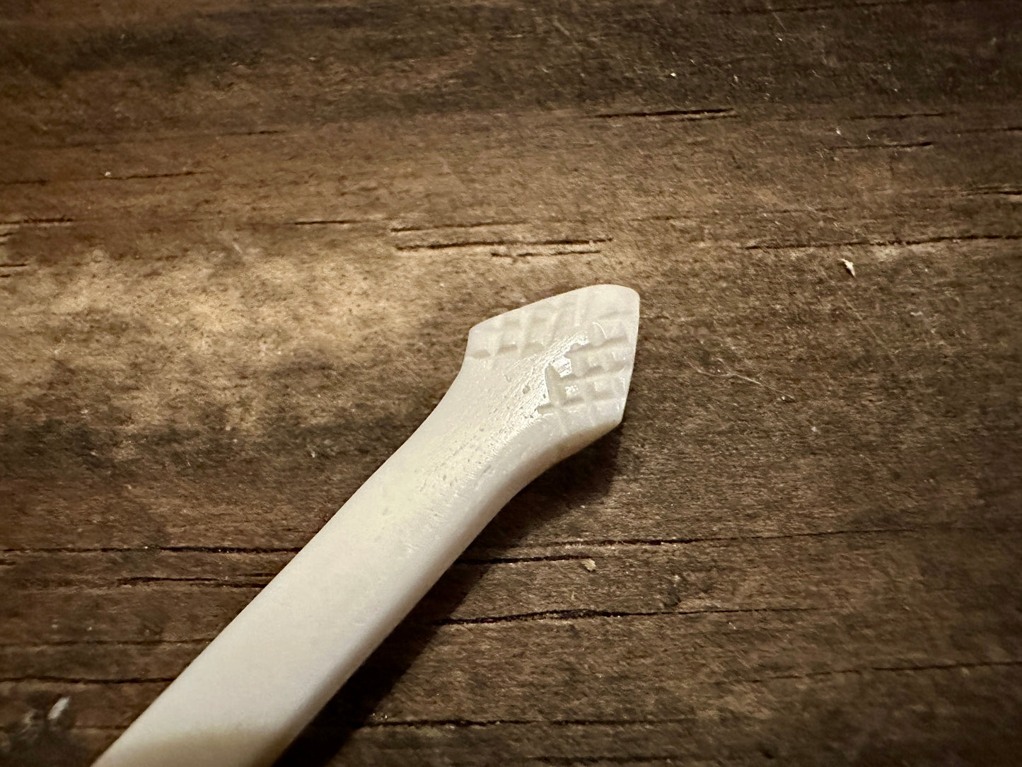 
                  
                    Feather finial bone spoon 
                  
                