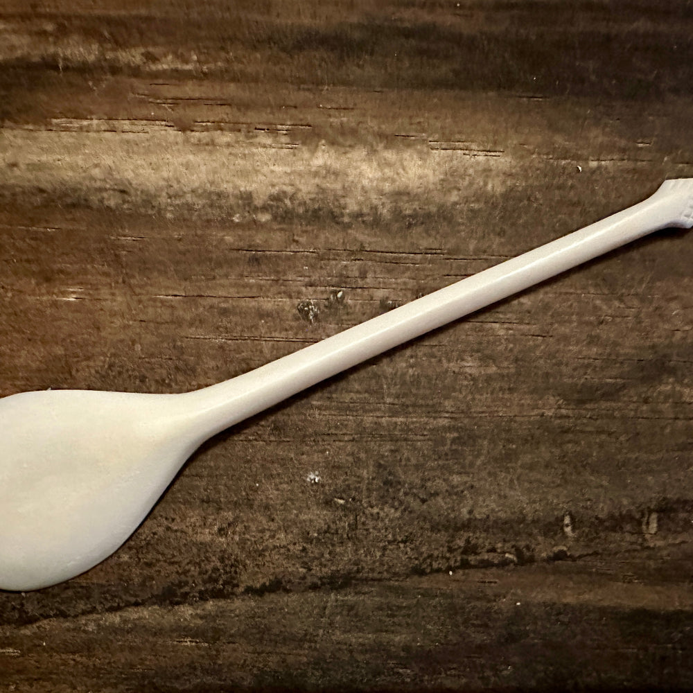 
                  
                    Feather finial bone spoon 
                  
                