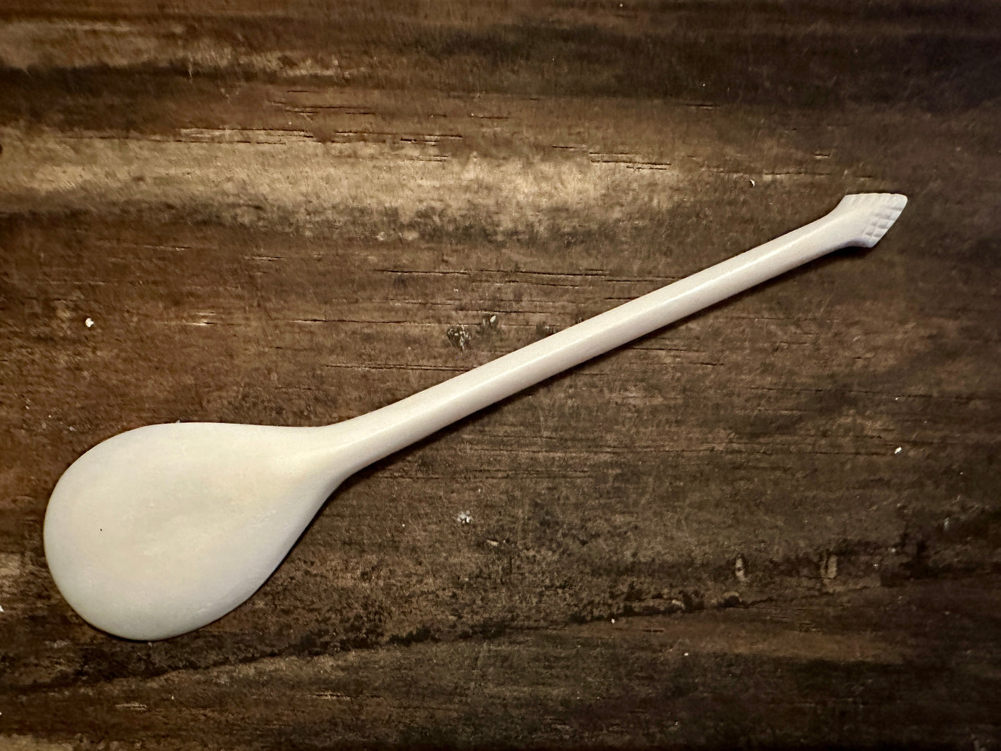 
                  
                    Feather finial bone spoon 
                  
                