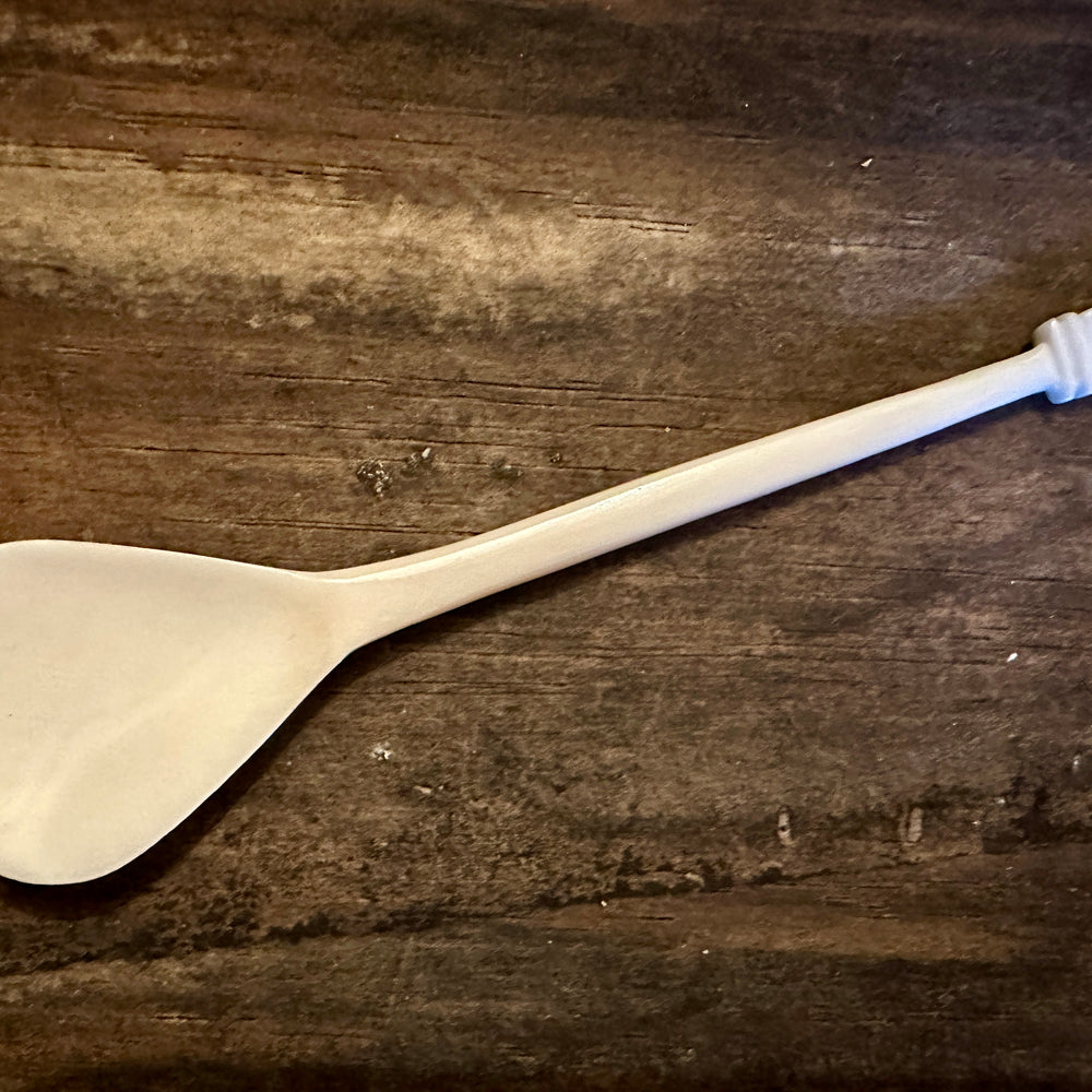 
                  
                    Scallop shell finial bone spoon 
                  
                