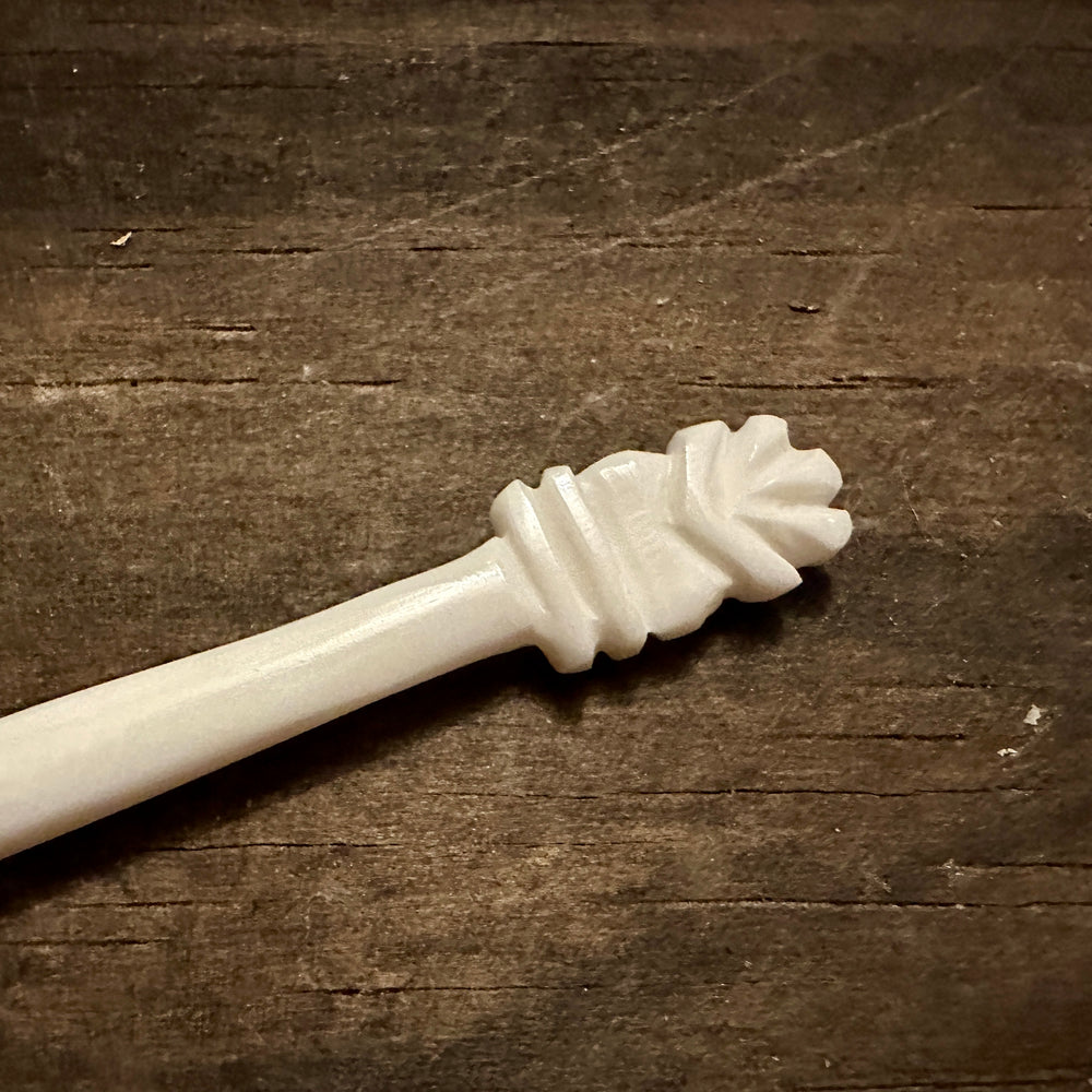 
                  
                    Scallop shell finial bone spoon 
                  
                