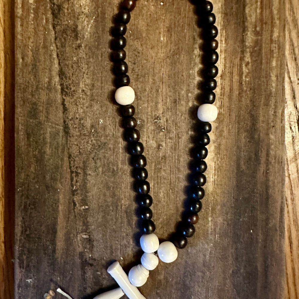 
                  
                    bone and horn rosary 
                  
                