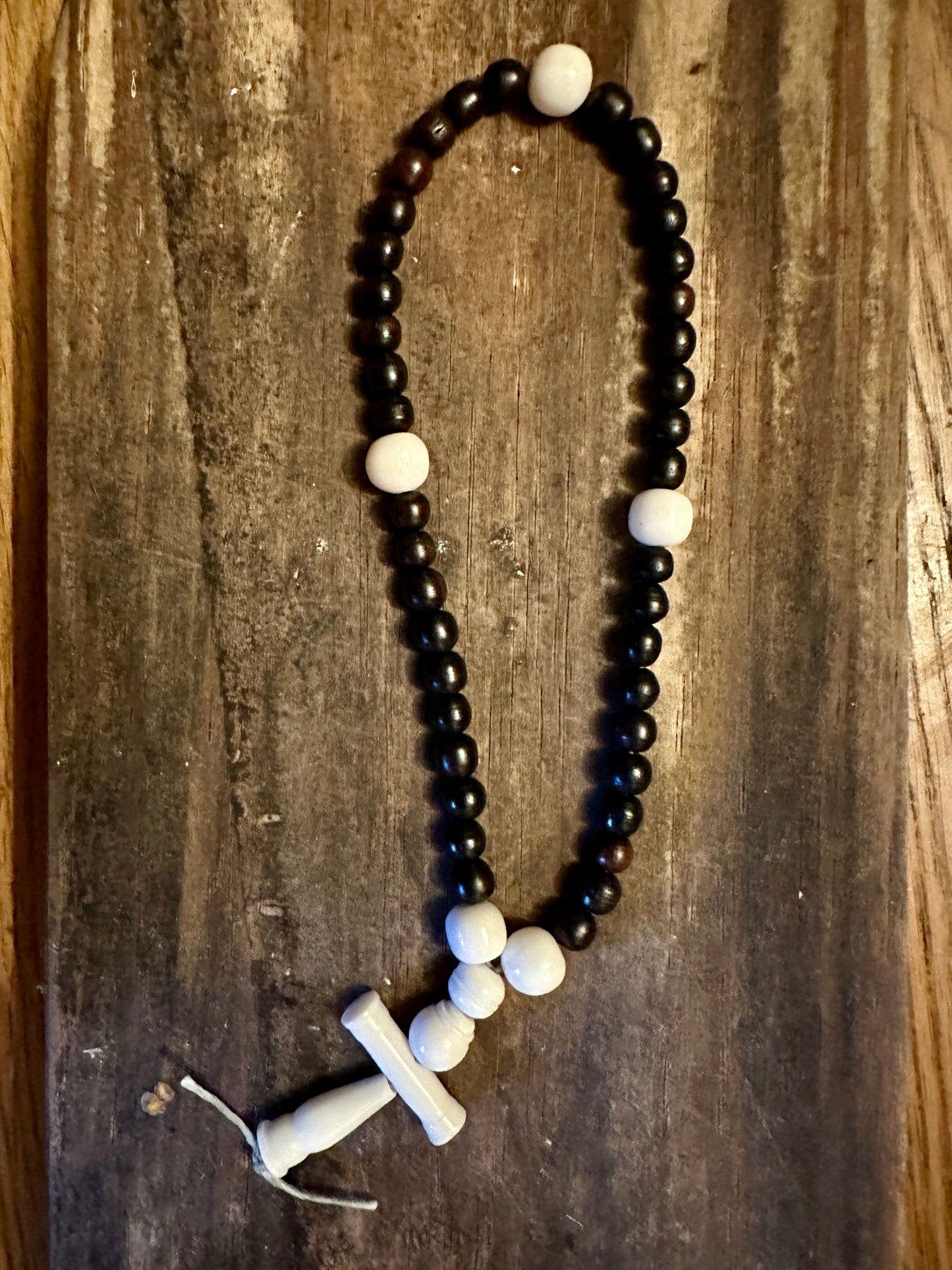 
                  
                    bone and horn rosary 
                  
                