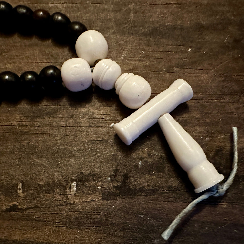 
                  
                    Bone and horn rosary

                  
                