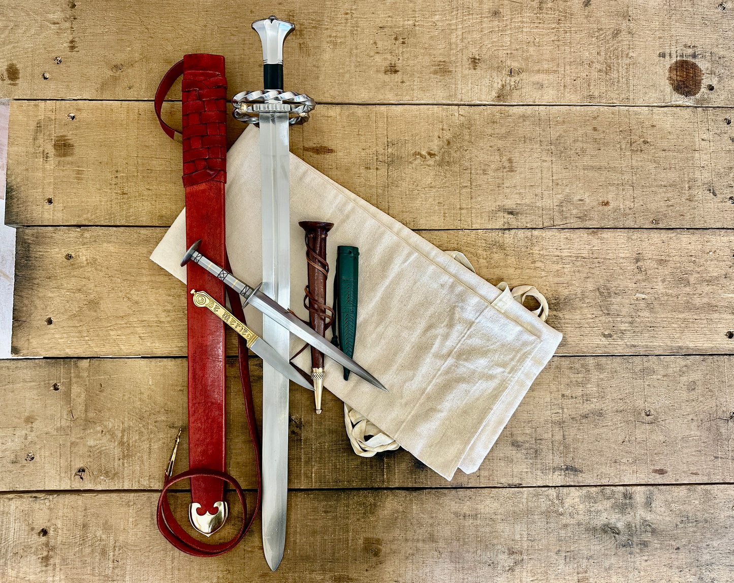 Katzbalger sword 1490 - 1540, 15th Century German Landsknecht steel Rondel, 13 - 16th Century decorated brass-handled eating knife and sword bag (out of scabbards)