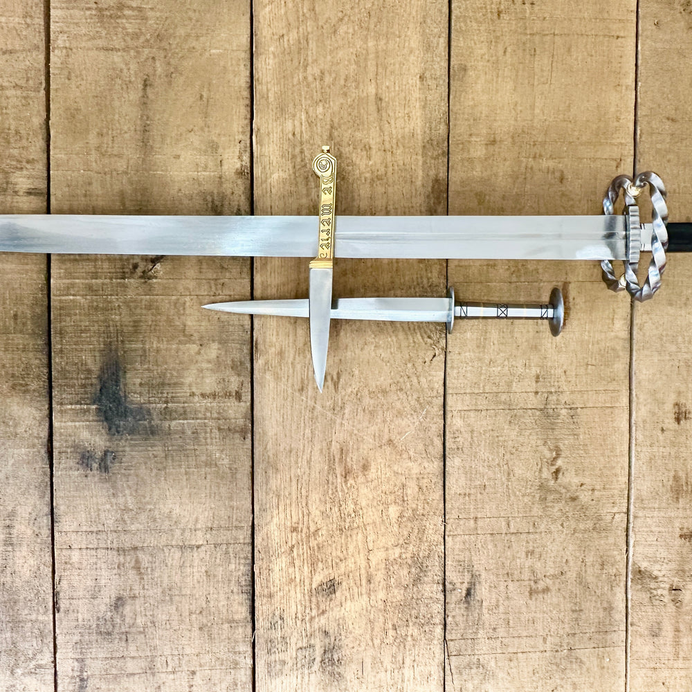 
                  
                    Katzbalger sword 1490 - 1540, 15th Century German Landsknecht steel Rondel, 13 - 16th Century decorated brass-handled eating knife crossed (no scabbards)
                  
                