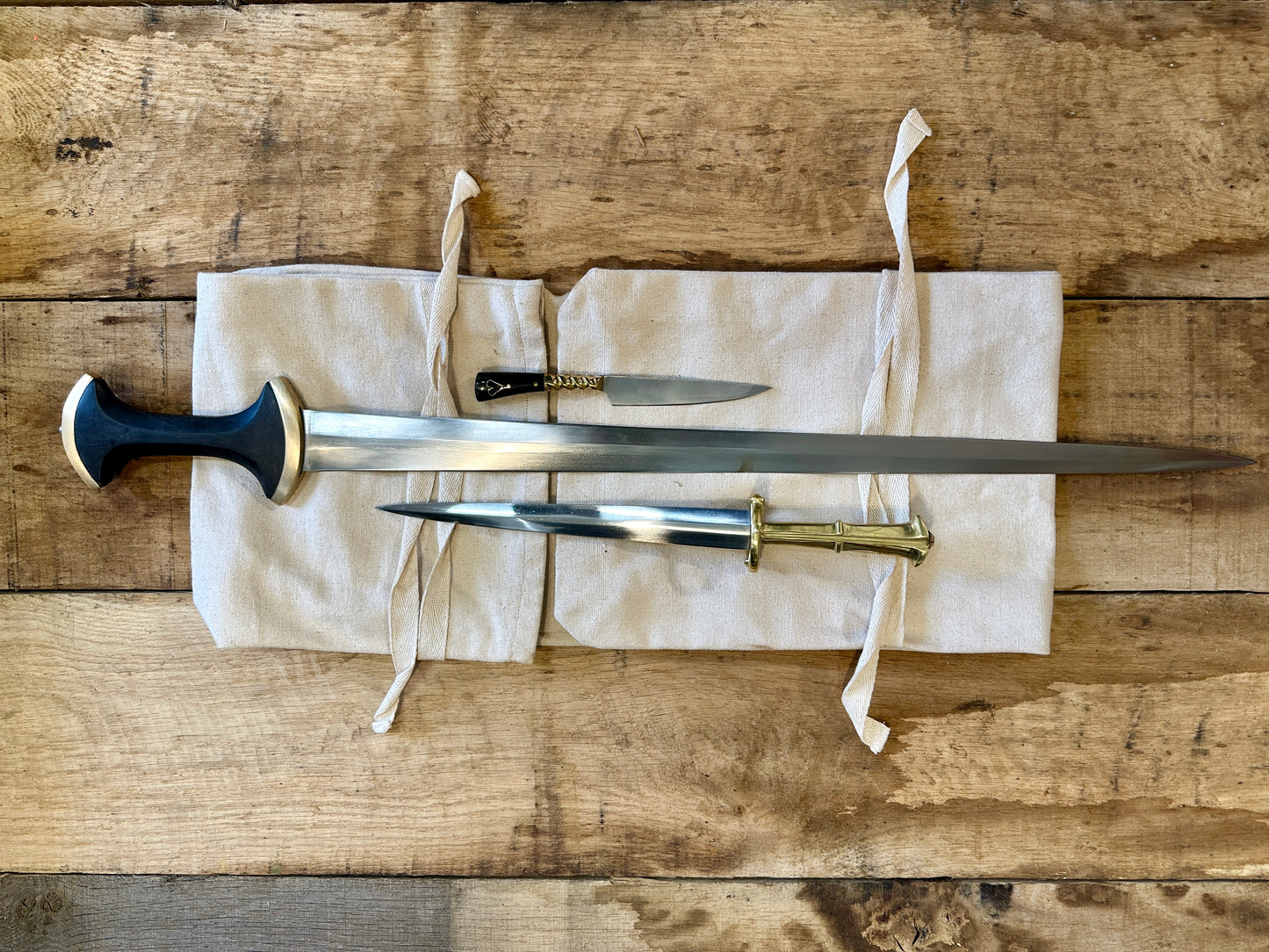 
                  
                    Degen sword bundle with Long Swiss/German Degen, Landsknecht S Quillon dagger and Tod Cutler Heart eating knife and free sword bag
                  
                