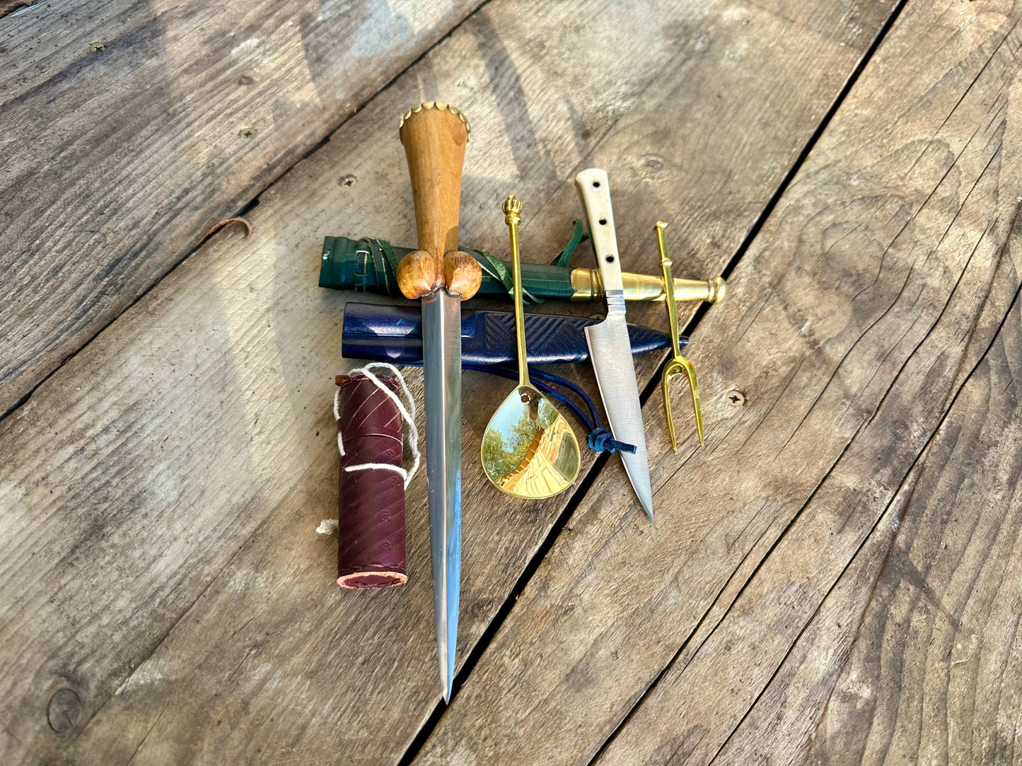 
                  
                    Tod Cutler My Lady's Bundle with purse bollock dagger, tcp, brass spoon and fork,, leather needle case
                  
                